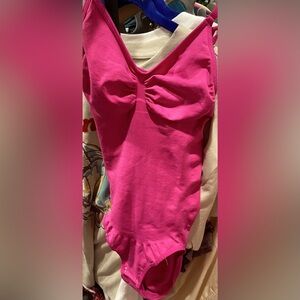 Hot Pink Bodysuit with Plunging V-Neckline and High-Cut Legs